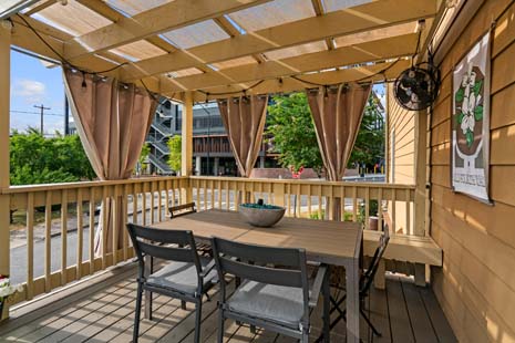 Shaded pergola offers perfect area for covered dining